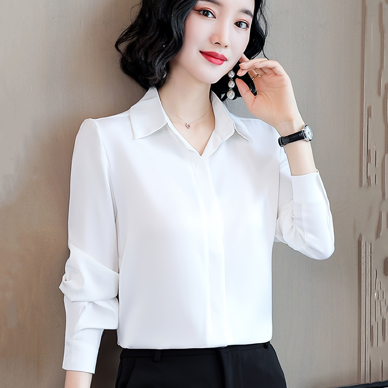 Long sleeve satin shirt with solid color, collared button-up design for women. Machine washable and perfect for spring/fall. Ideal for sophisticated adults with luxurious style.