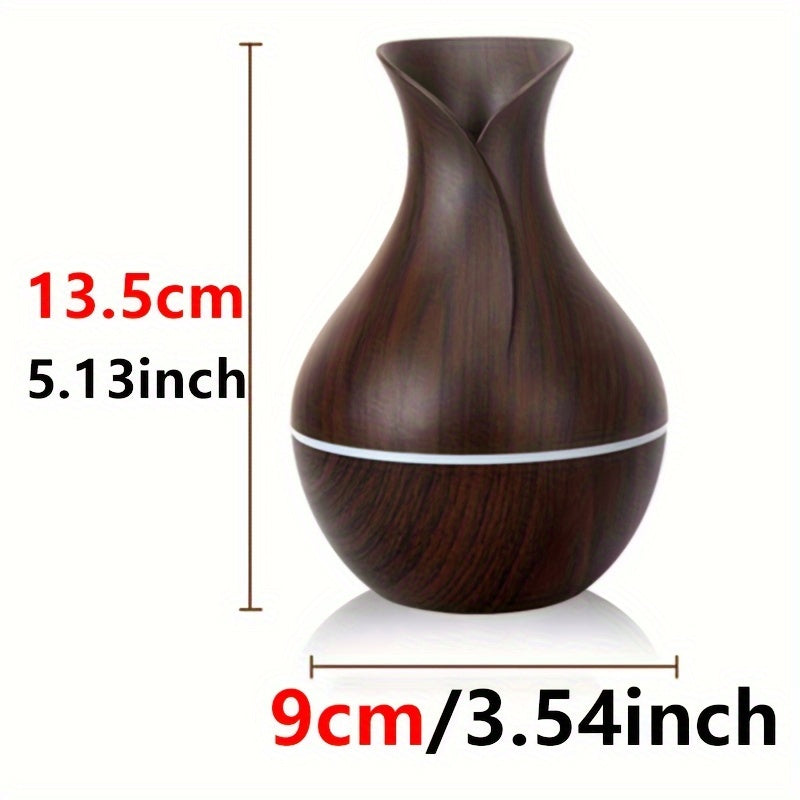 New 150ml vase-shaped air humidifier with hollow wood grain design, LED light, and small night light. USB-powered and automatic shut-off. Ideal for office, home, or bedroom.