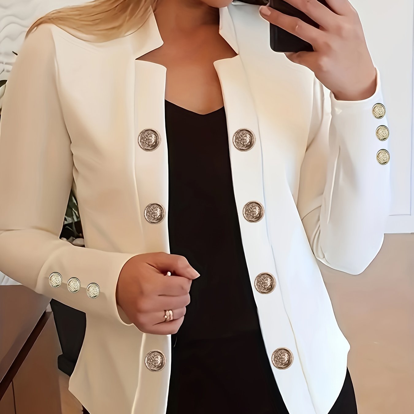 Elegant solid color women's knit jacket with double-breasted front and cuff buttons.