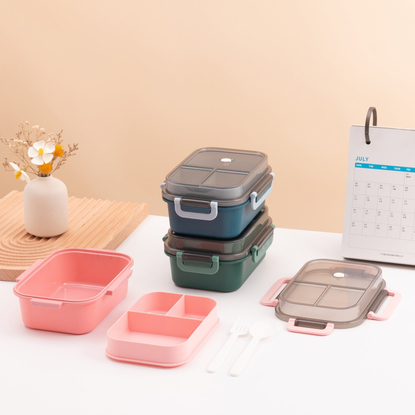 Premium high quality lunch box made from food grade PP material with two compartments, suitable for students and portable use. This bento box has a large capacity and is microwaveable for convenient heating. It is multi-functional and can be used for