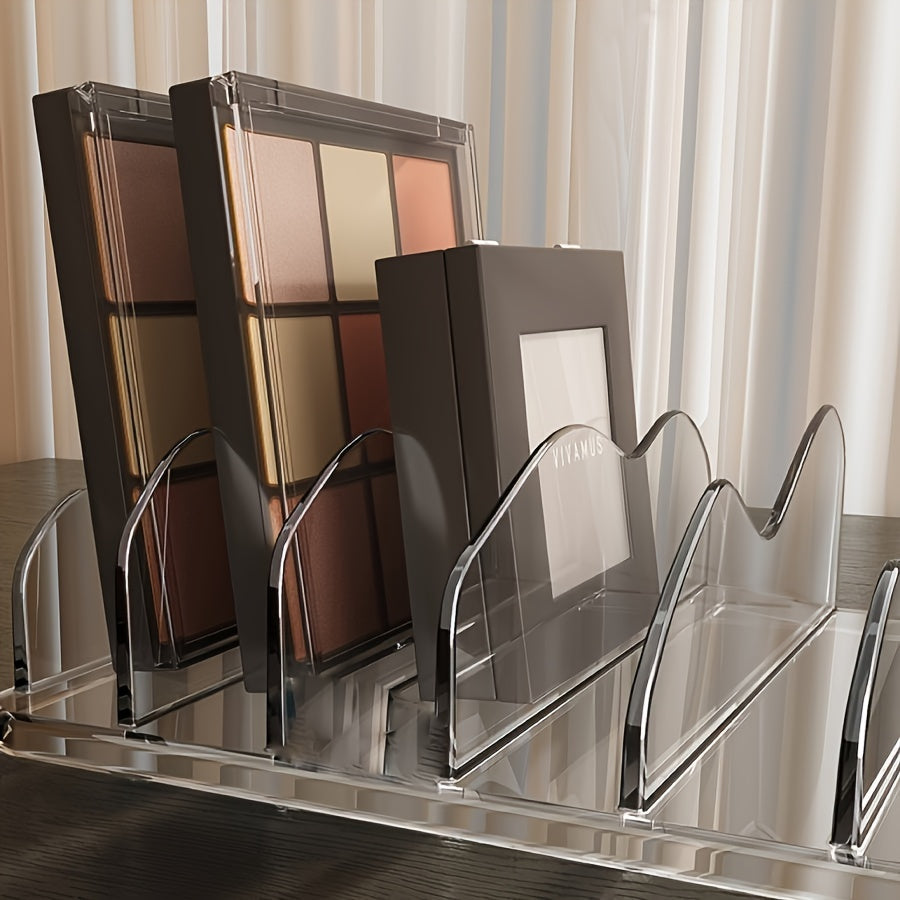 Plastic makeup palette organizer with wave divider, countertop storage rack for cosmetics. Compact and lightweight, under 68.58 cm tall. Stores multiple makeup palettes.