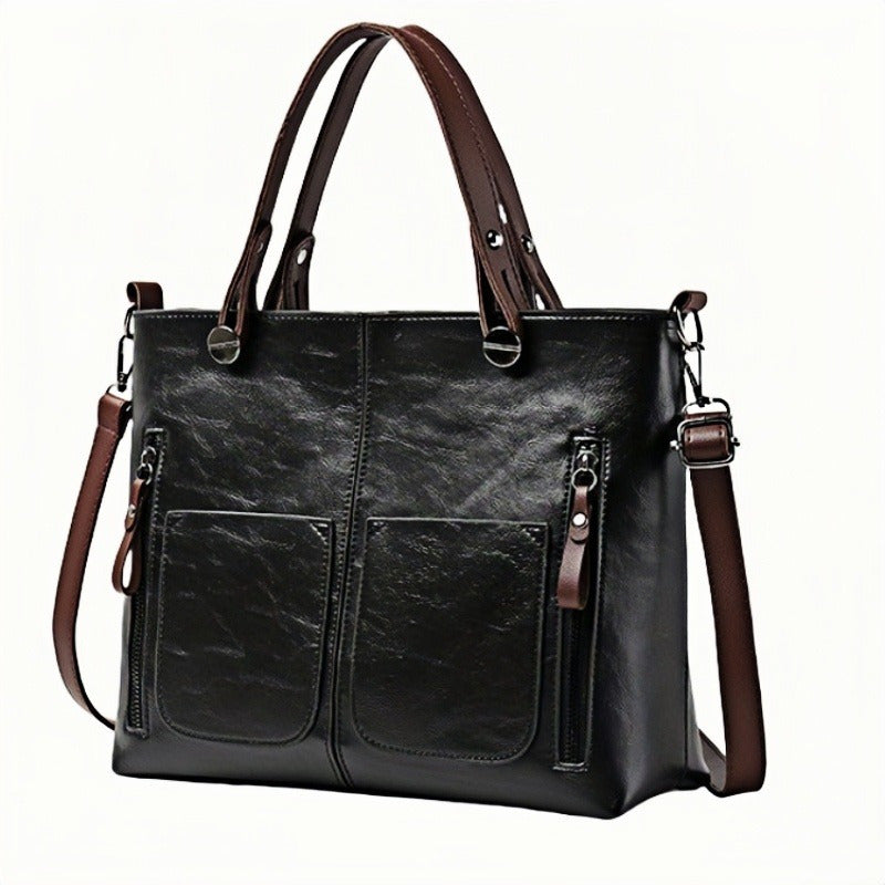 Vintage-style women's tote bag with adjustable strap, large capacity, multiple pockets, zipper closure, deep brown.