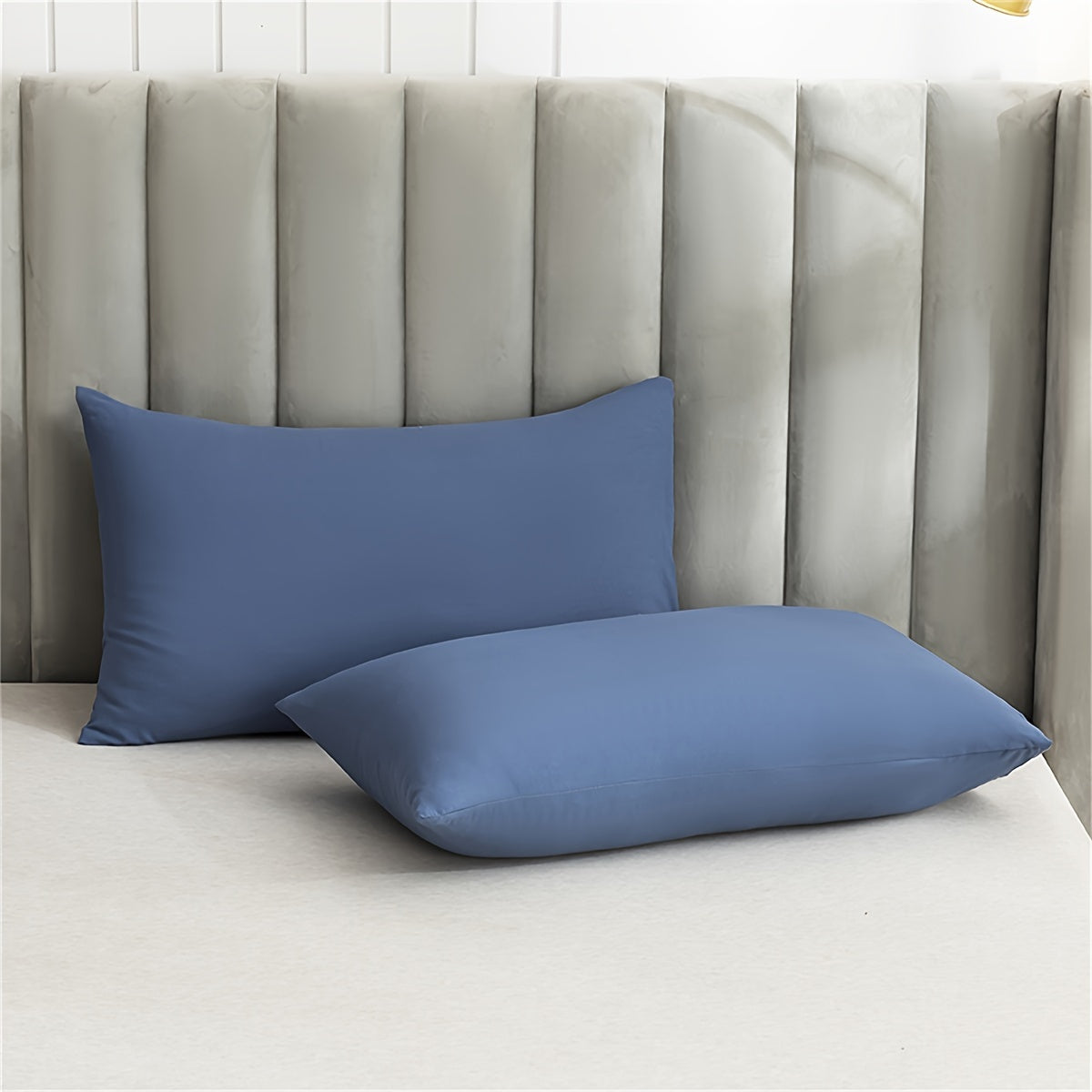 Soft and plush pillowcase with a solid color design, featuring a thick and cozy feel. Includes an envelope closure and is machine washable, making it ideal for creating a comfortable bedroom atmosphere.