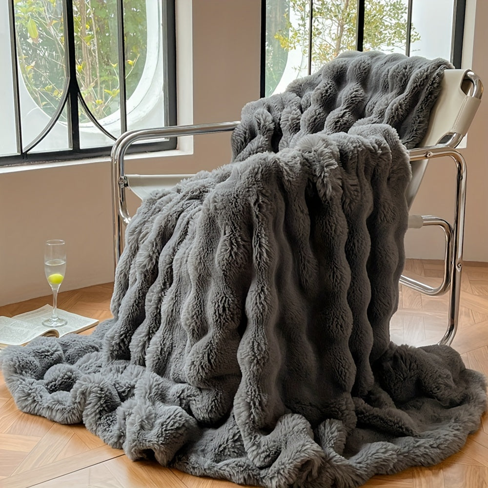 Soft and plush, this solid color blanket is perfect for snuggling up on the couch, in the office, or while camping and traveling. It's a versatile gift that can be used year-round.