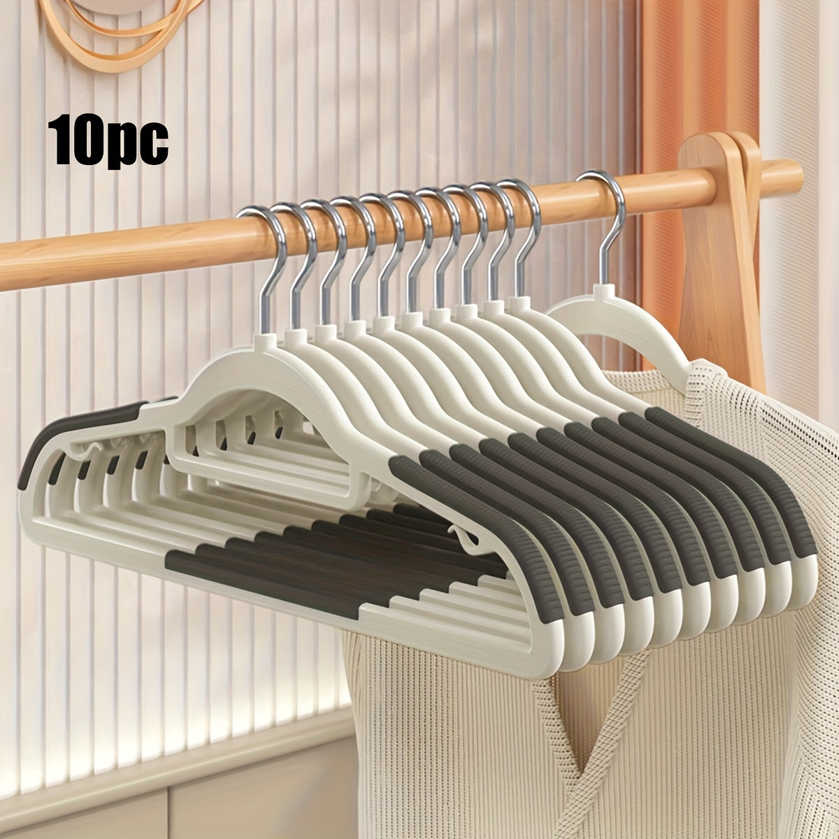 10 non-slip heavy duty clothes hangers for storage and organization in bedroom, bathroom, and home.