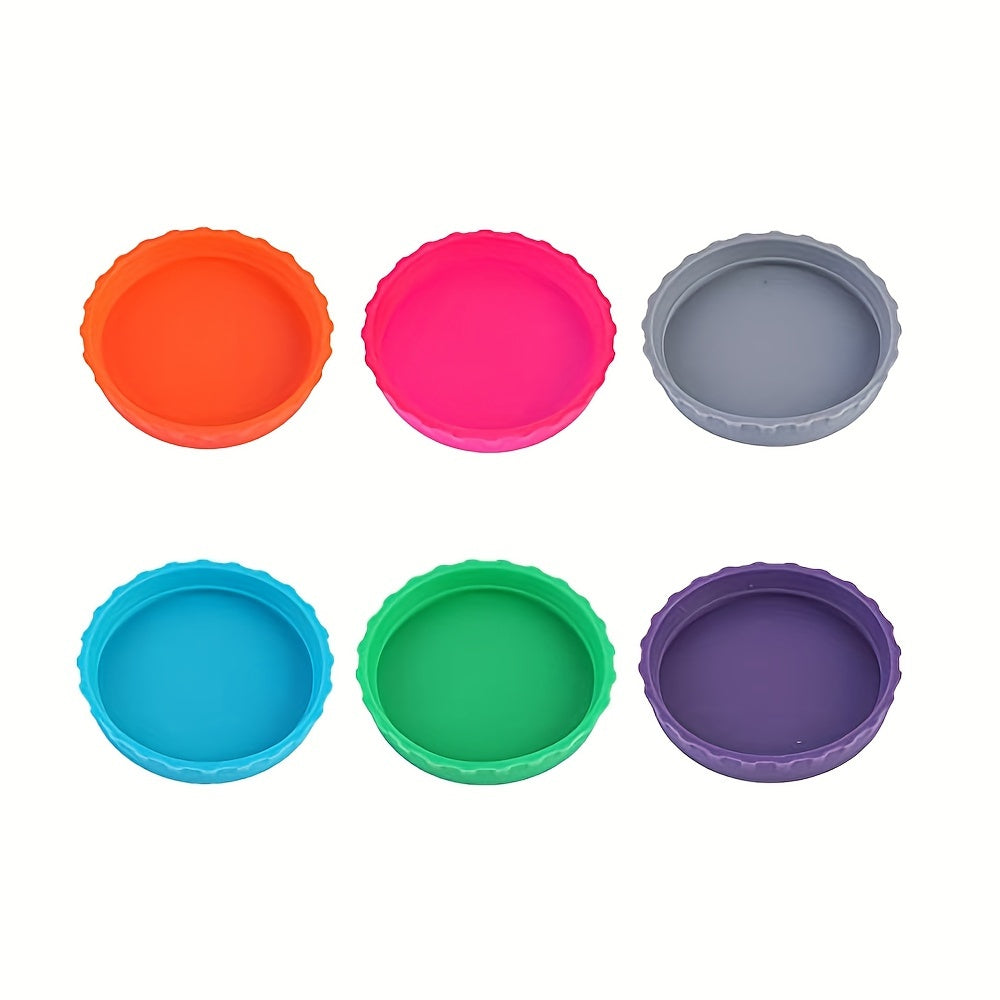 Six silicone soda can lids that prevent spills and fit standard soda cans. They come in a variety of colors and can also be used to cover juice and beverage cans.