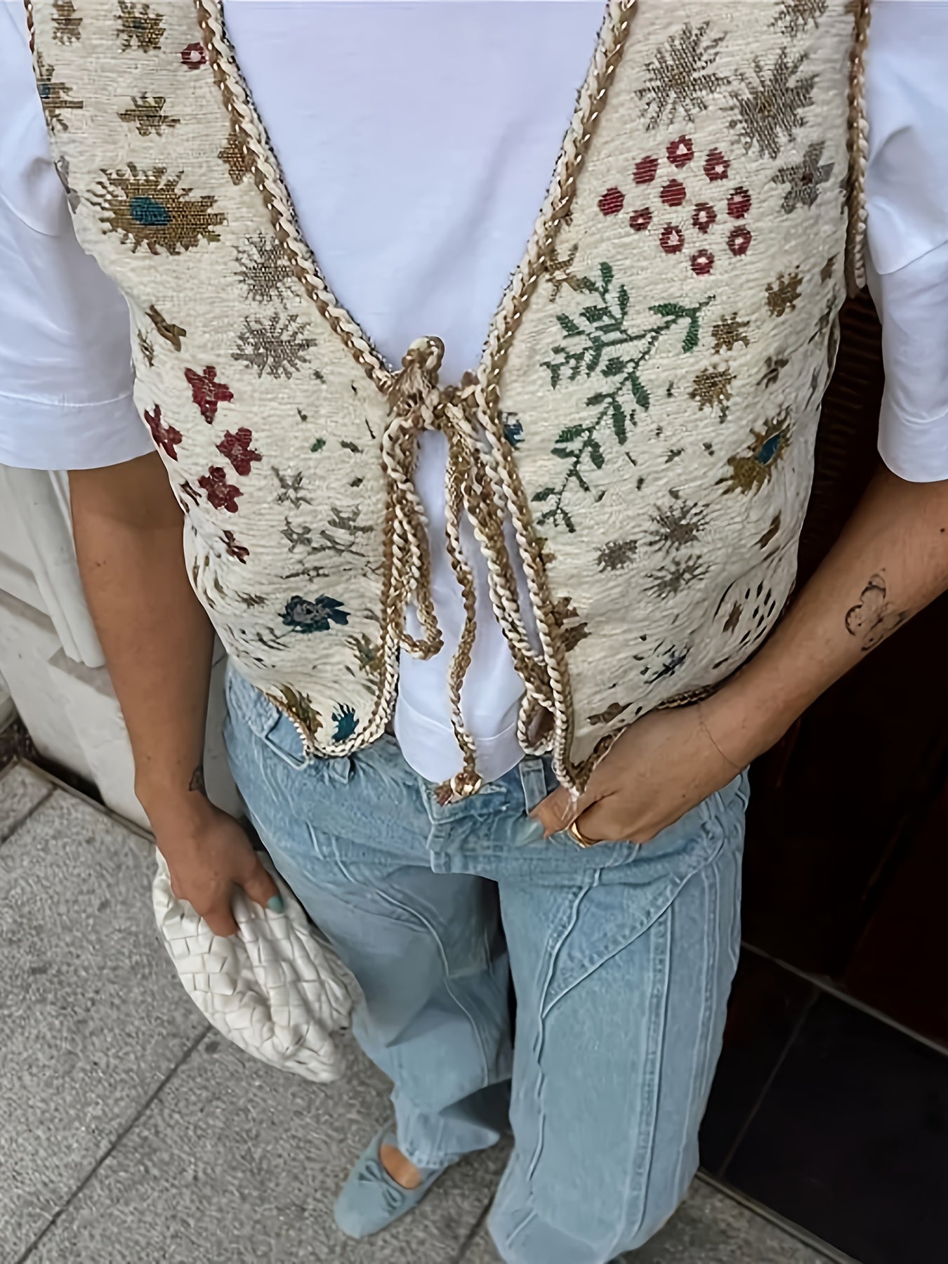 Women's embroidered plant pattern polyester vest with v-neck, sleeveless design, jacquard belt, and waterproof fabric - perfect for spring/fall fashion.