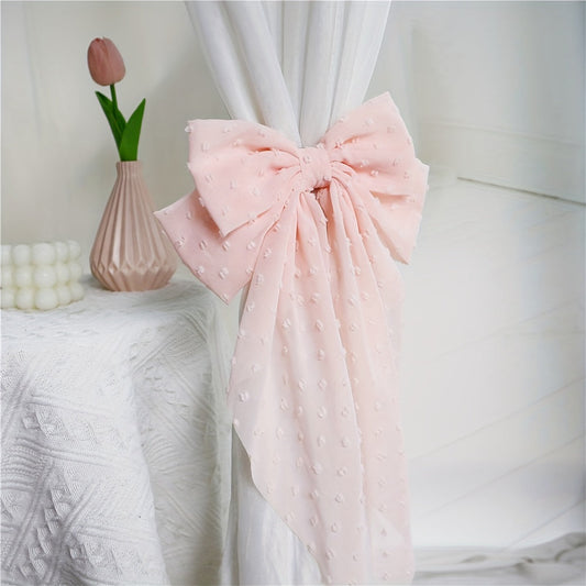 Add a touch of style to your bedroom, living room, and kitchen with these chic bow holdbacks for easy curtain control - the perfect accessory for stylish home decoration.