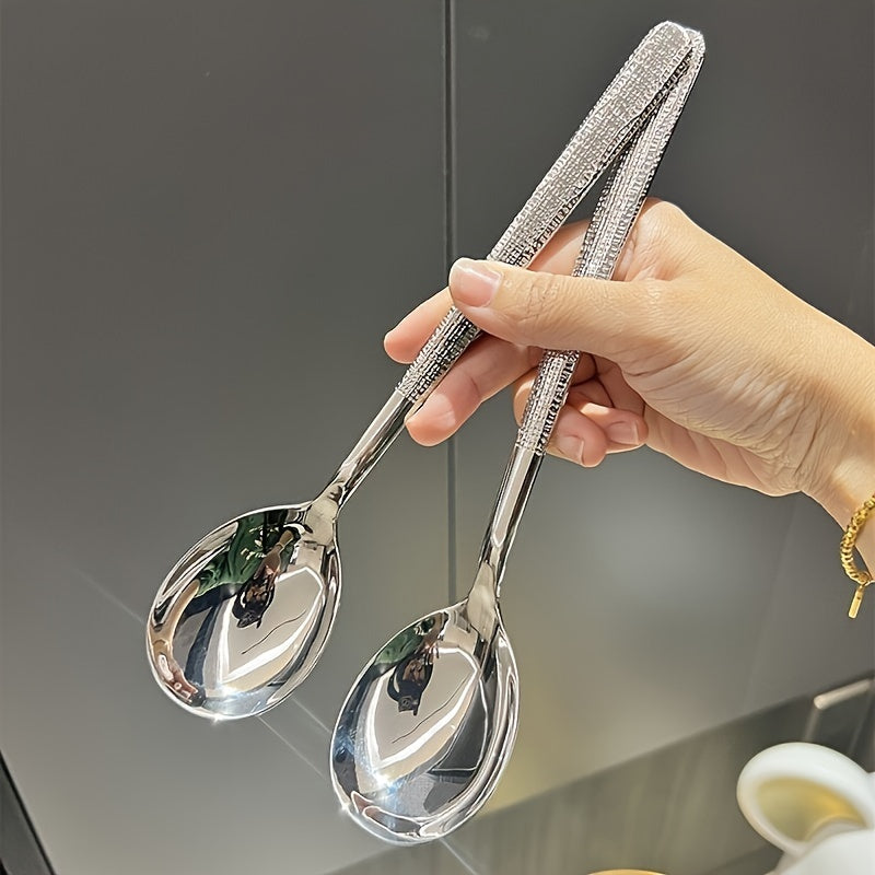 Durable stainless steel spoon with hammered round head design - ideal for kitchen and restaurant use. Easy to clean with a mirror polished finish. Suitable for soups, rice, and desserts.