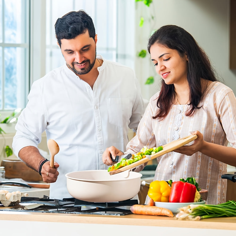 18-piece luxury cookware set featuring non-stick coating and removable handles, with a stylish brushed aluminum finish. This essential kitchen cooking supplies set is compatible with induction cooktops and is safe for use in the dishwasher and oven. An