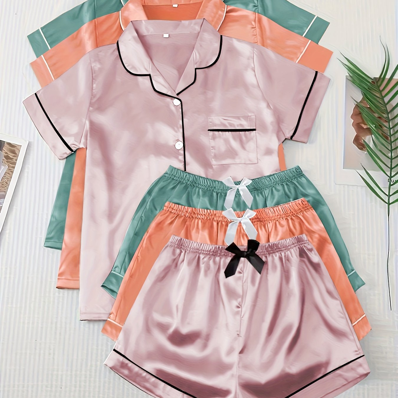 3 sets of satin pajama sets with short sleeve collar tops and bow shorts for women's loungewear.