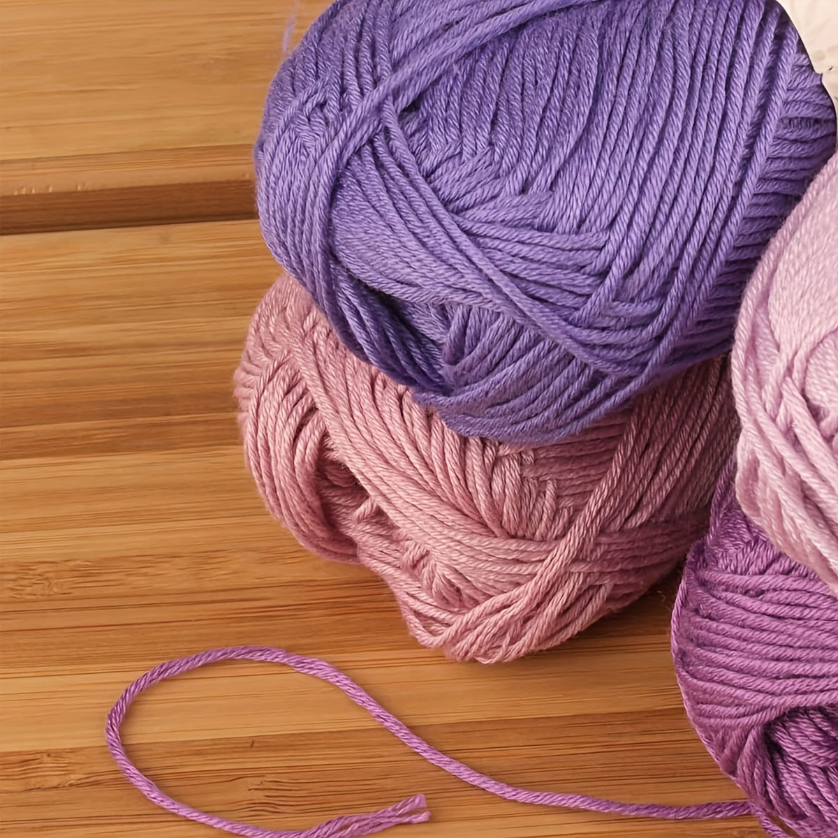 Bundle of 4 soft and cozy acrylic yarns, each weighing 50g. Made from 100% acrylic and 4-ply handcraft yarn, perfect for DIY crochet and knitting projects. Ideal as a DIY gift.