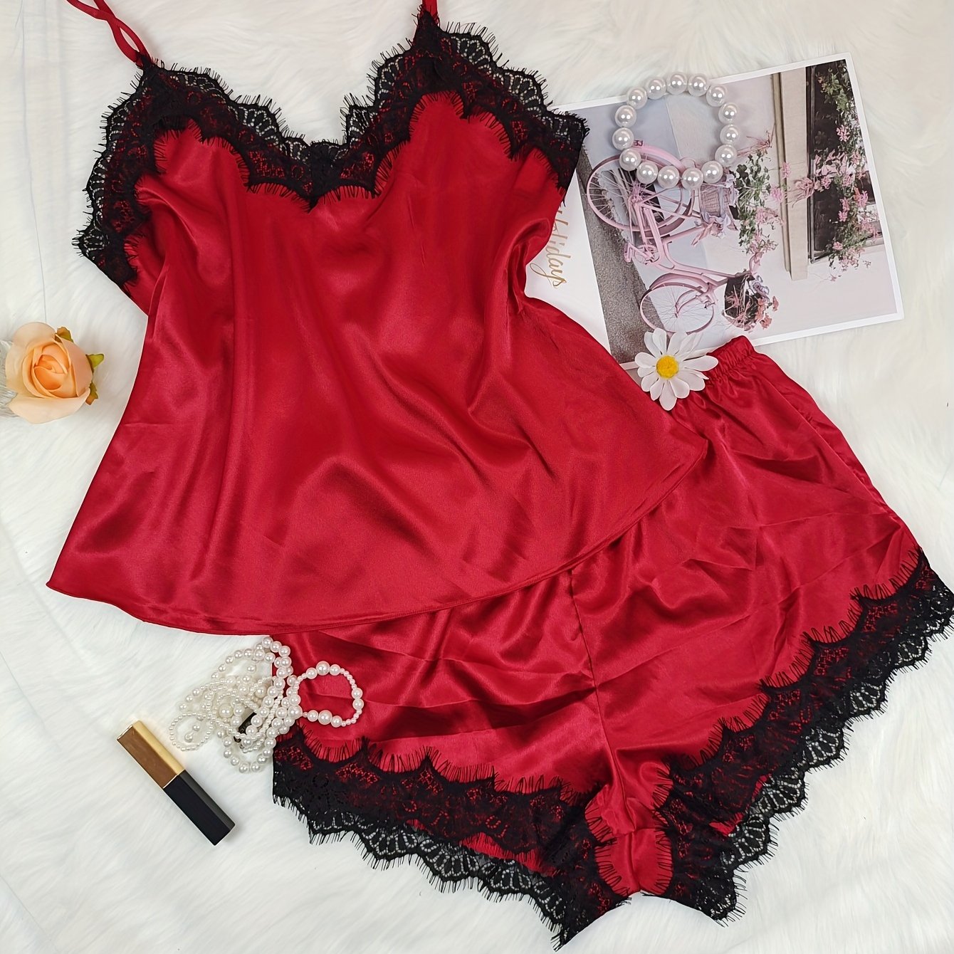 Women's sexy pajama set with V-neck, off-shoulder design, lace trim, and soft polyester blend for year-round comfort.