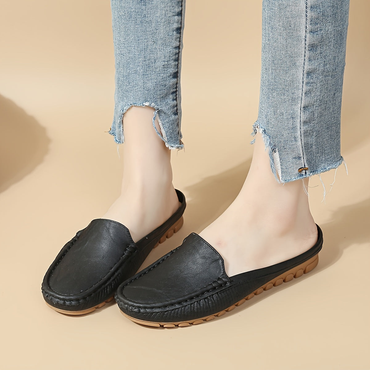 Stylish slip-on mule sandals with half-toe design, perfect for summer.