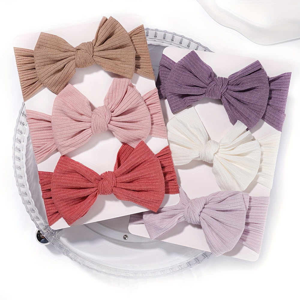 3 soft and stretchy bow hairbands for girls made of comfortable polyester, ideal for hairstyling