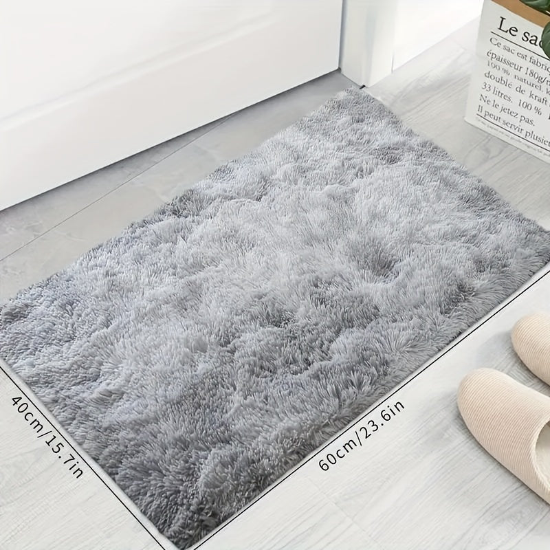 Transform your living room or bedroom with this Super Soft Shag Area Rug! Made of stain resistant and lightweight washable polyester, this indoor rug in solid gray is the perfect addition to your room decor and holiday celebrations. Get 1PC now and