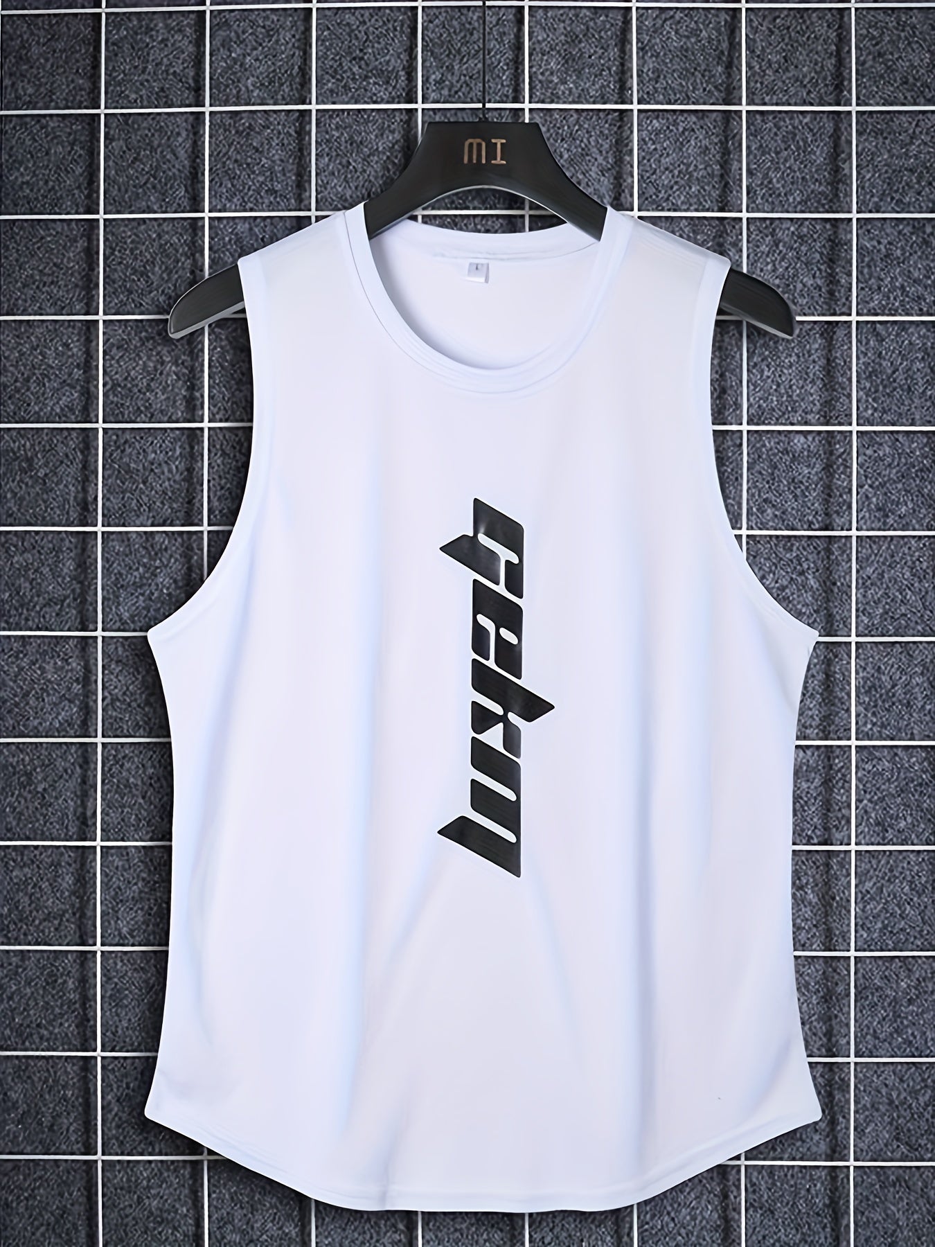 Men's 2-piece outfit with letter print tank top and loose basketball shorts.