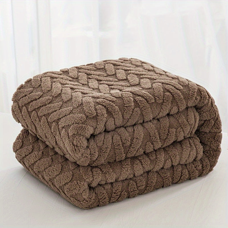 One piece of a high-weight, double-sided plush fleece throw blanket in a contemporary brown style. This blanket is machine washable and suitable for all seasons. Made of knitted polyester with a jacquard design, it features no prints and is perfect for