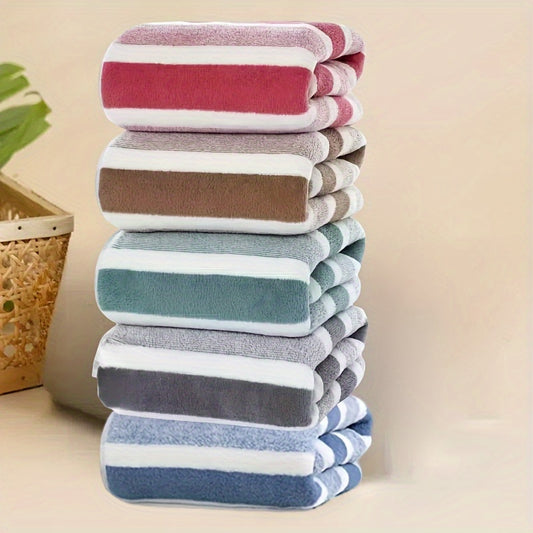 Luxurious 5-piece Coral Fleece Towel Set with modern striped pattern, super absorbent, quick-drying, and soft on skin. Featuring a space theme, these hand towels are ideal for bathroom essentials. dimensions are 34.8 x 74.93 cm.