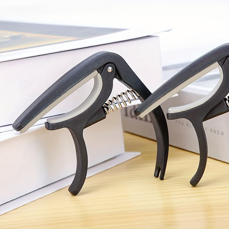 High-quality ABS guitar capo for acoustic, electric guitars and more - durable and easy to clip on.