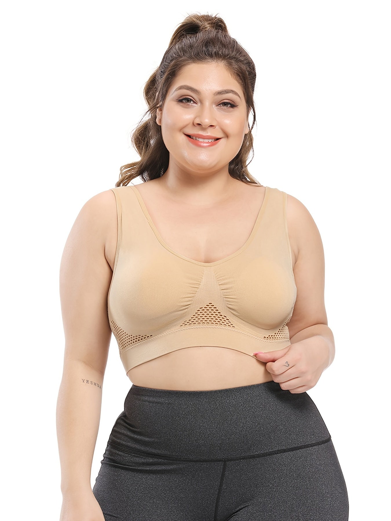 Seamless purple sports bra for plus size women, with breathable mesh fabric, push-up support, removable pads, and comfort fit. Available in sizes 36XL to 40XL.