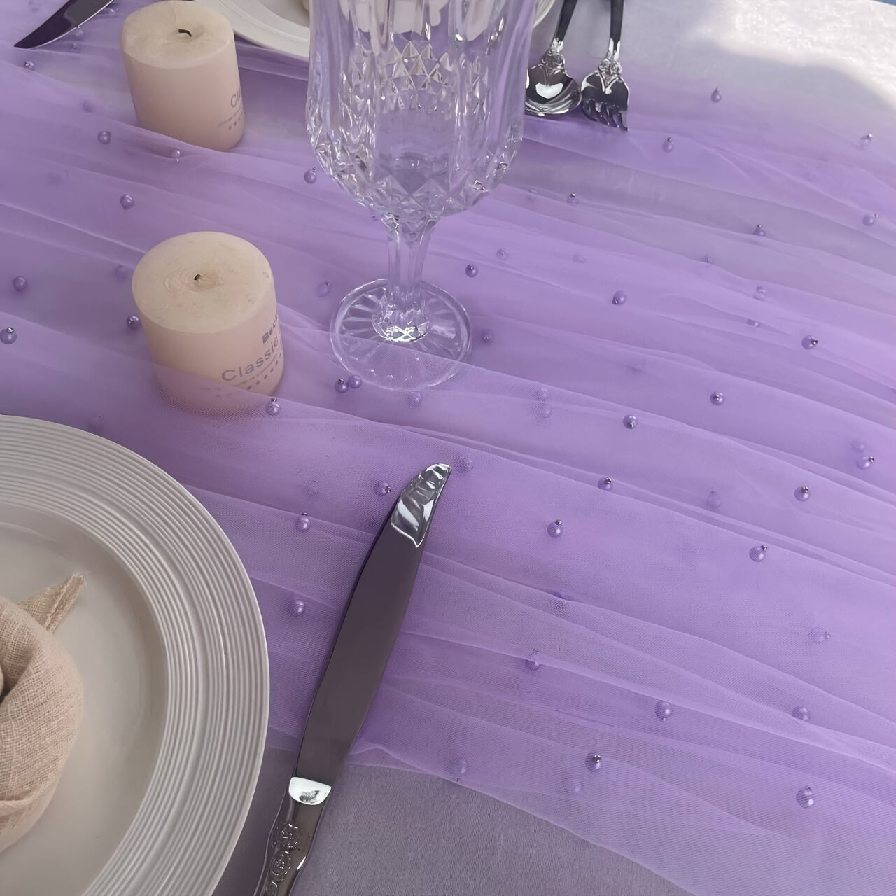 Elegant pearl bead tulle table runner, perfect for weddings and parties. Can also be used as a chair sash or backdrop drape. Made from 100% polyester fabric with delicate bead detailing.