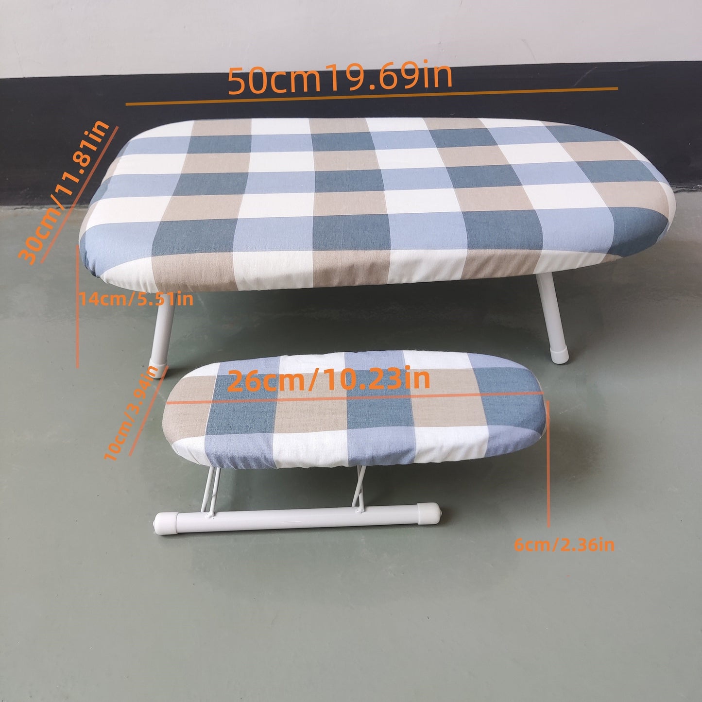 Compact clothes folding board with ironing sleeve, perfect for small spaces and on-the-go use.