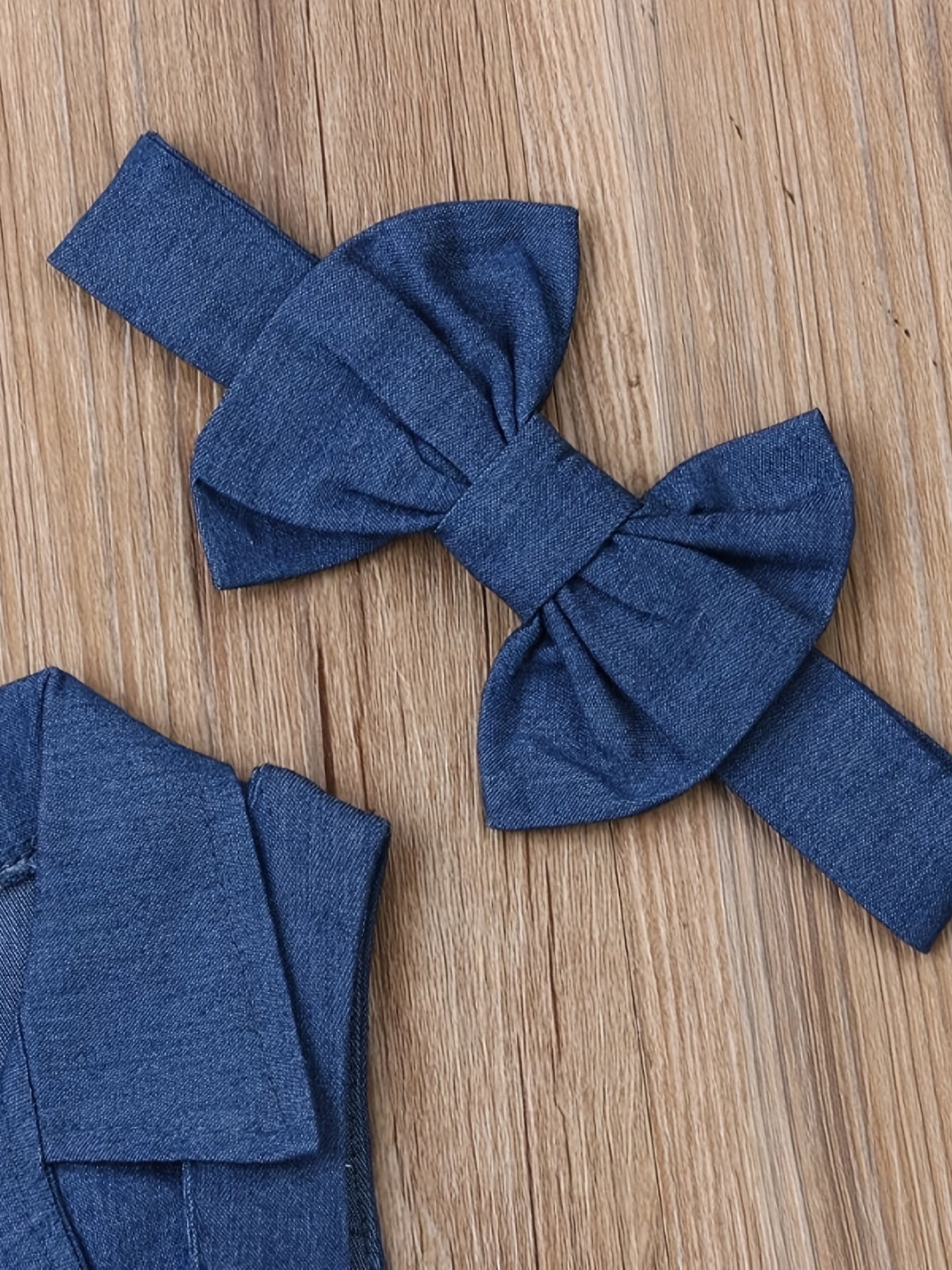 Sleeveless denim romper set with bow headband for kids, perfect for summer.