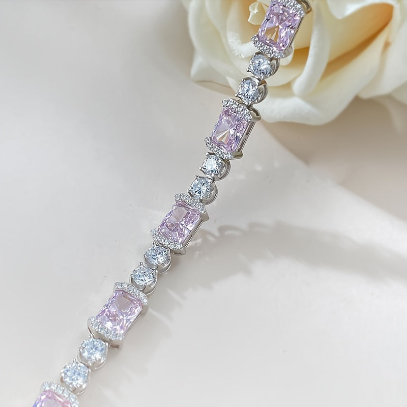 This stunning Sterling Silver Bracelet features dazzling Pink Cubic Zirconia stones. Ideal for everyday wear or as a thoughtful gift, especially for those born in October.