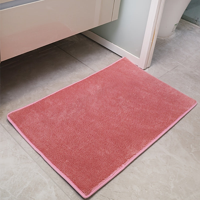 Machine-made oblong bath rug made from quick-dry absorbent knit fabric with non-slip features. Crafted from polyester fiber, this rug is 1.8cm thick and has a weight of 780gsm. Suitable for entryways, bedrooms, living rooms, and garages. Easy to care for