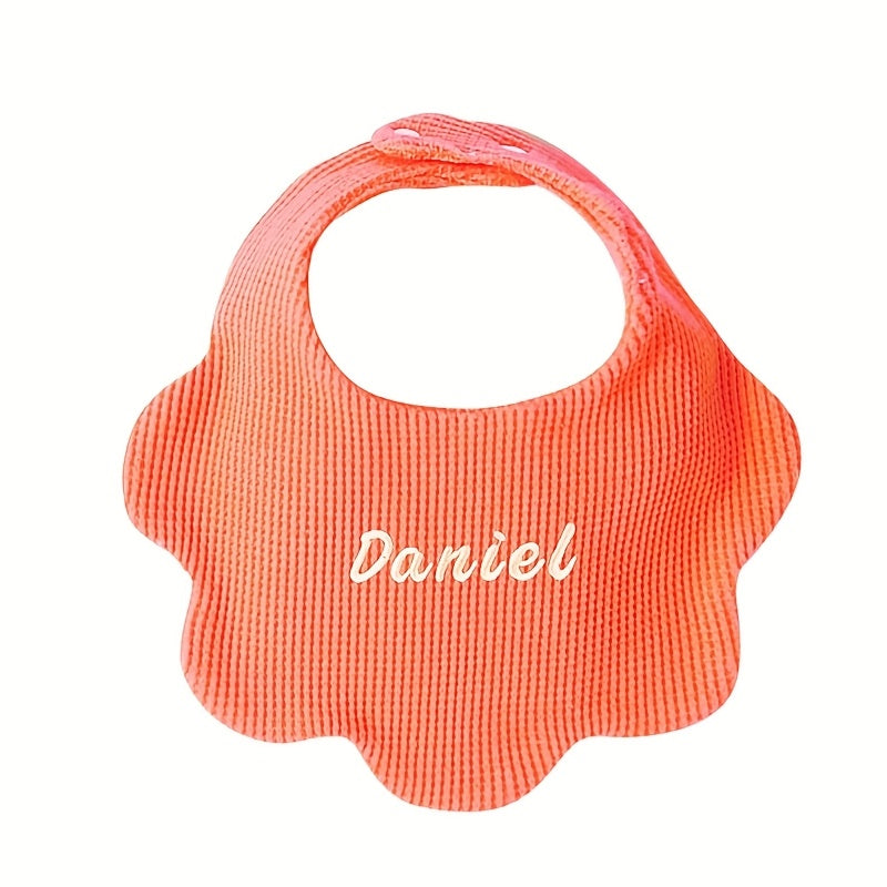 Customize your baby's style with our Personalized Drool Bibs. These bibs feature custom embroidery, an adjustable snap closure, and soft absorbent knit fabric. They make the perfect gift for a baby shower or holiday. Suitable for babies aged 0-3 years