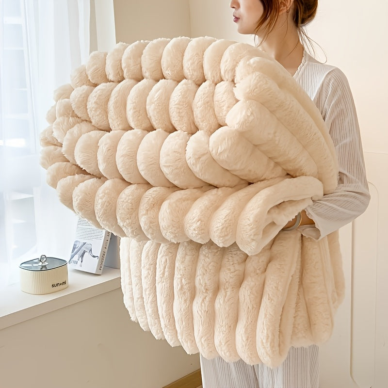 Get cozy with this multifunctional blanket made of ultra-soft milk fleece. Featuring a modern striped texture, this blanket is perfect for all-season comfort on your bed, sofa, or even while camping. Machine washable for easy care, this blanket is an