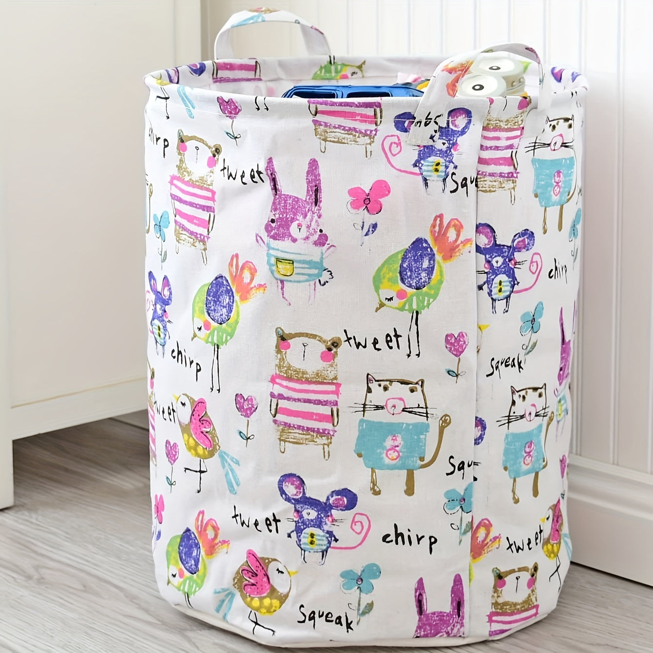 Large capacity, foldable laundry basket with a stylish Nordic design, perfect for organizing toys and essentials in your bathroom, bedroom, or dorm. Made from durable fabric for organized living.