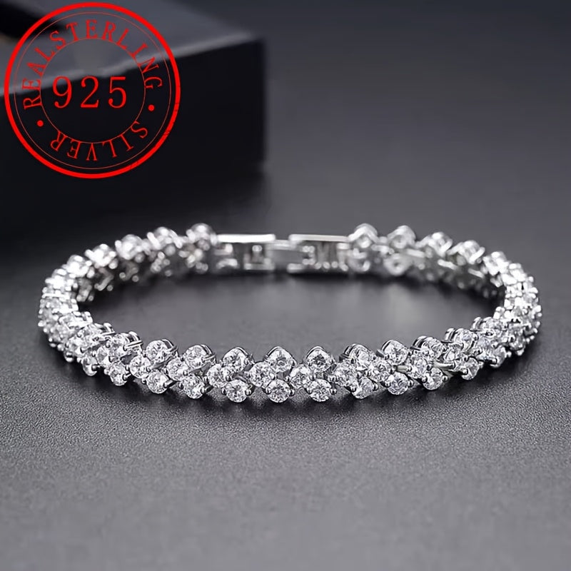 This elegant tennis bracelet is made of high-quality 925 sterling silver and features synthetic Moissanite stones. With its classic luxury design, this unisex bracelet is the perfect accessory for daily wear or gift-giving. It is also suitable for all