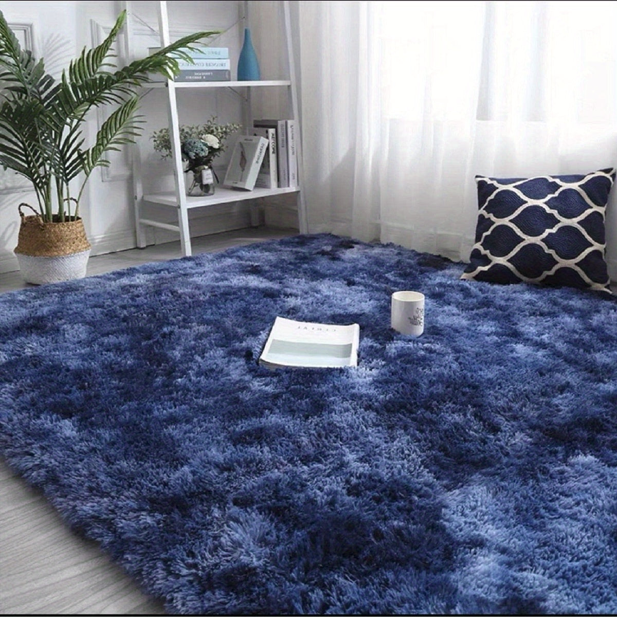 Elevate your space with our 1pc Stylish Simple Tie-dye Long Pile Carpet. This soft and comfortable rug is free of formaldehyde and any peculiar smell. It features non-shedding and non-fading qualities, making it perfect for a variety of spaces including