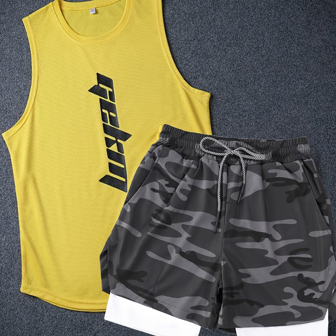 Men's 2-piece fashion set with letter print tank top and drawstring shorts.