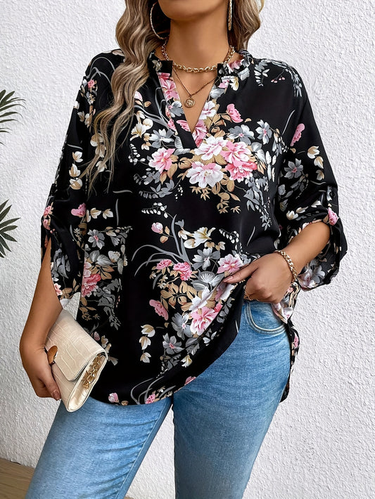 Elegant plus-size women's floral print blouse with ruffle sleeves in stylish black, perfect for casual to semi-formal occasions.