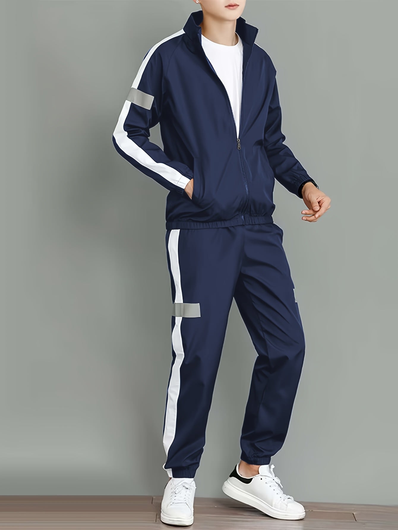 Stylish men's casual set with jacket and loose pants, ideal for spring and autumn activities.