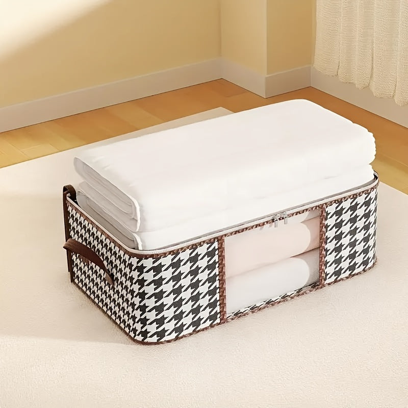 A durable canvas houndstooth storage bag with a zippered closure and handles, perfect for quilts, clothes, and linens. Lightweight and portable, this organizer is ideal for keeping your wardrobe, bedroom, or dorm neat and tidy. Its modern aesthetic adds