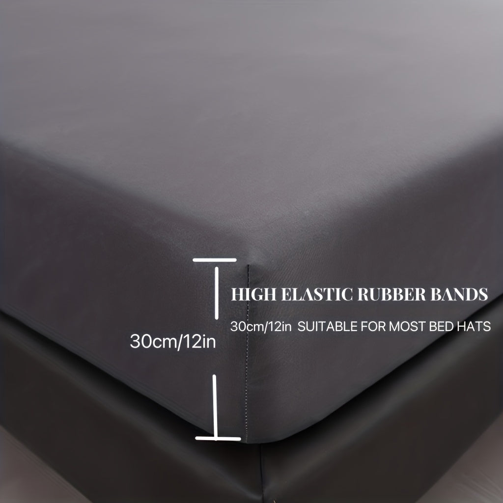 Upgrade your bedding with our Ultra-Soft Waterproof Fitted Sheet in Solid Black. Made with breathable and comfortable material, this sheet features deep pockets for a secure fit. Easy to machine wash, this sheet is perfect for any bedroom, guest room