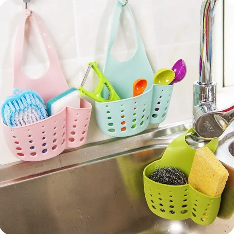 Space-saving design kitchen sink caddy made of adjustable plastic, perfect for soap and sponge storage. Hang it on your sink for easy access and keep your kitchen organized.