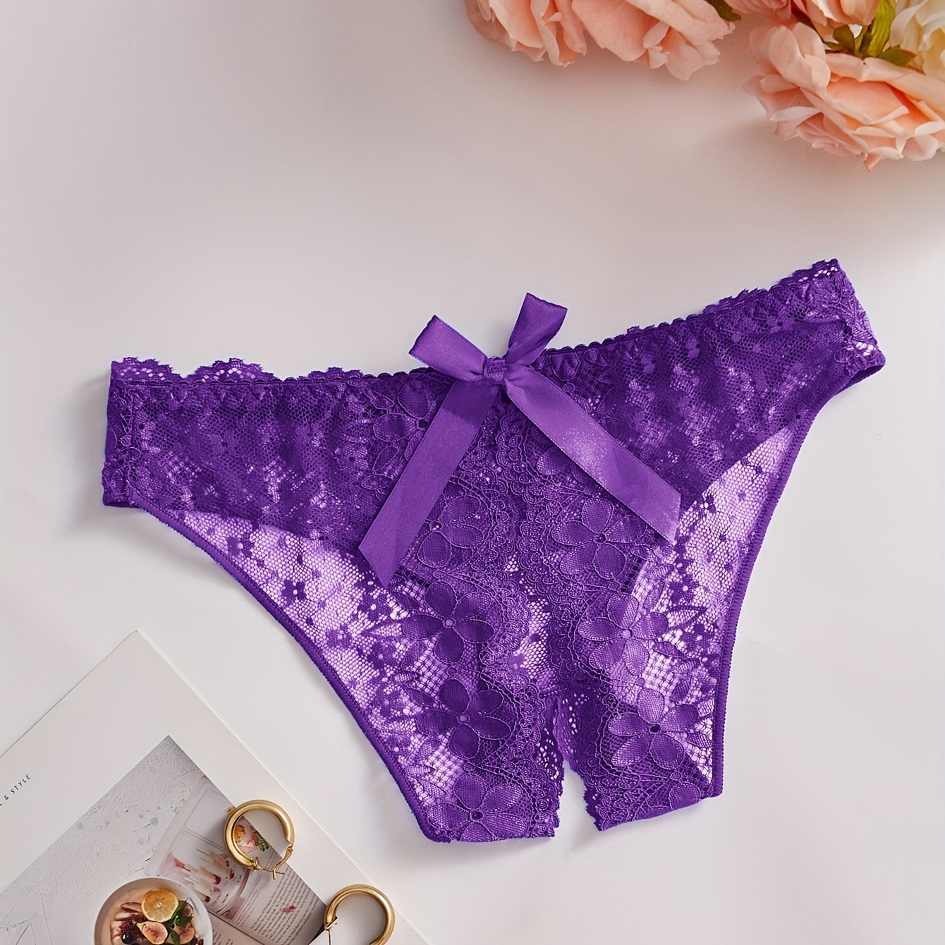 See-through lace crotchless briefs for women's sexy lingerie.