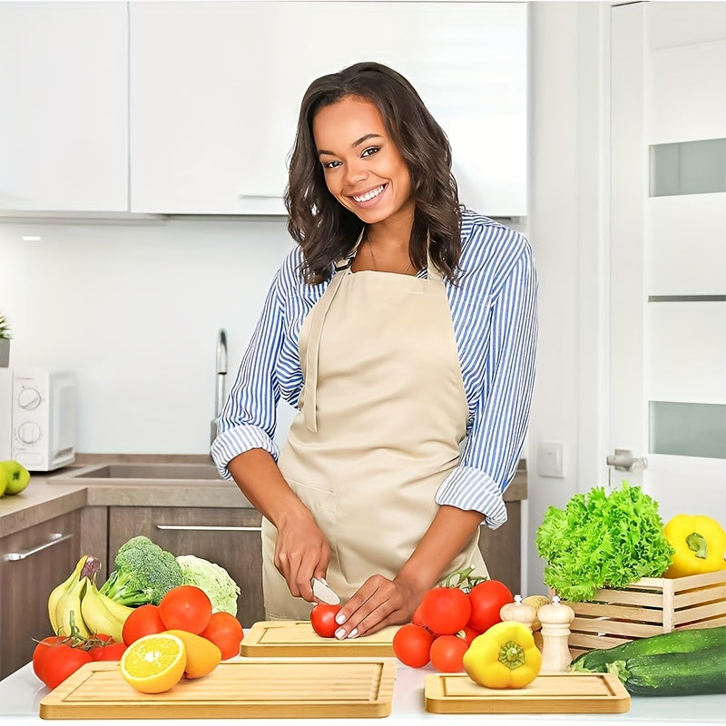 Set of 3 bamboo cutting boards with juice grooves, perfect for chopping meat and veggies. Features easy grip handles and makes a great kitchen gadgets gift.