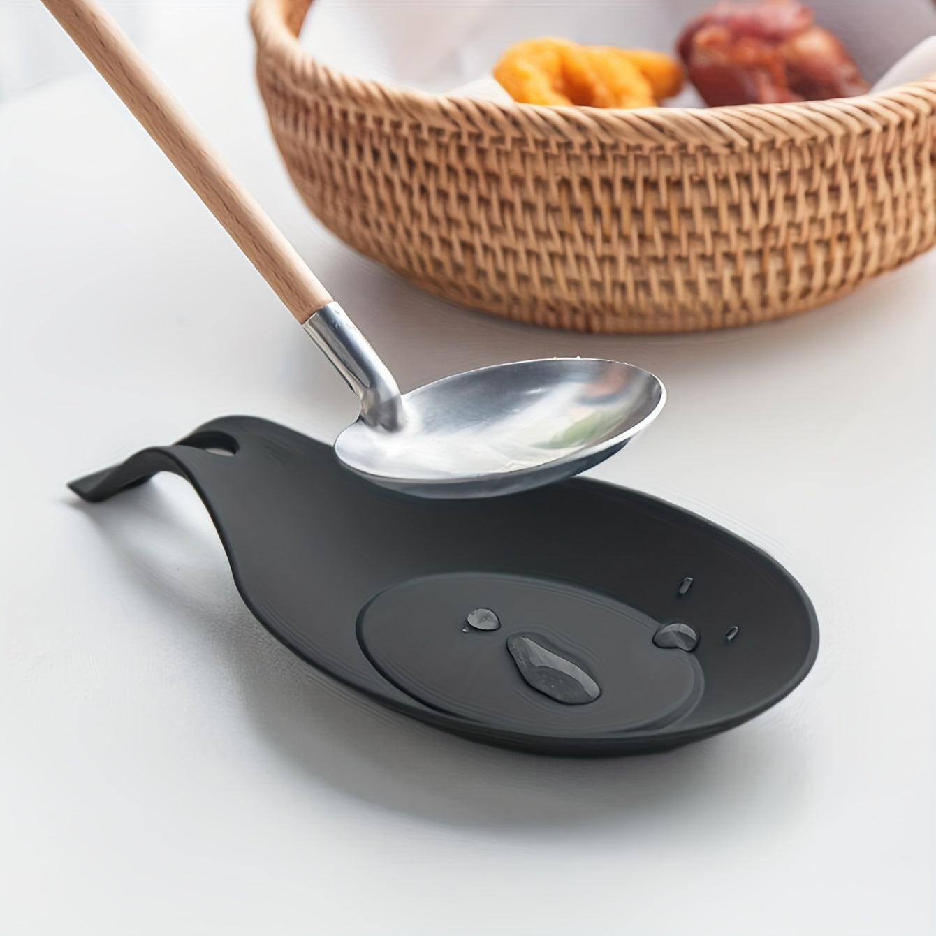 Durable, non-slip silicone spoon pad for kitchen utensils, heat-resistant and easy to clean.