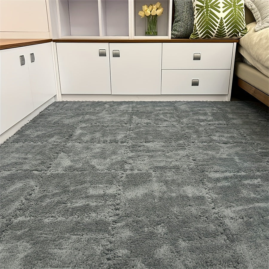 Bring style and comfort to your bedroom or living room with these plush interlocking carpet tiles. Made from a soft and washable blend of EVA and polyester, these tiles are perfect for adding warmth and coziness to your space. Each tile measures