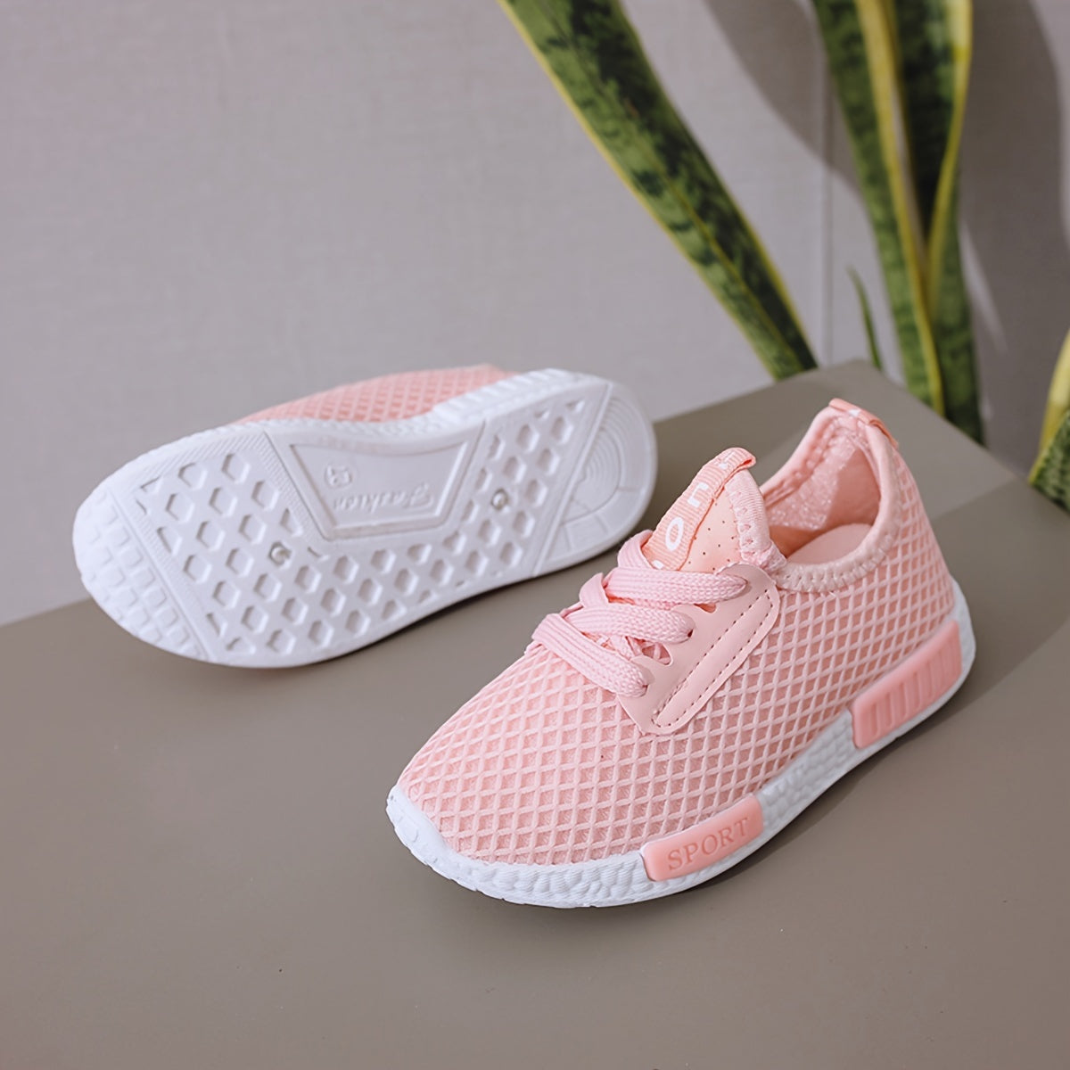 Breathable mesh sneakers for boys and girls, lightweight with lace closure and comfortable PVC sole.