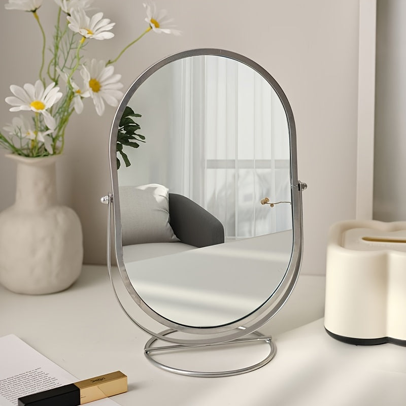 360° rotatable freestanding makeup mirror with iron frame, high-definition surface, perfect for bedroom or vanity table.