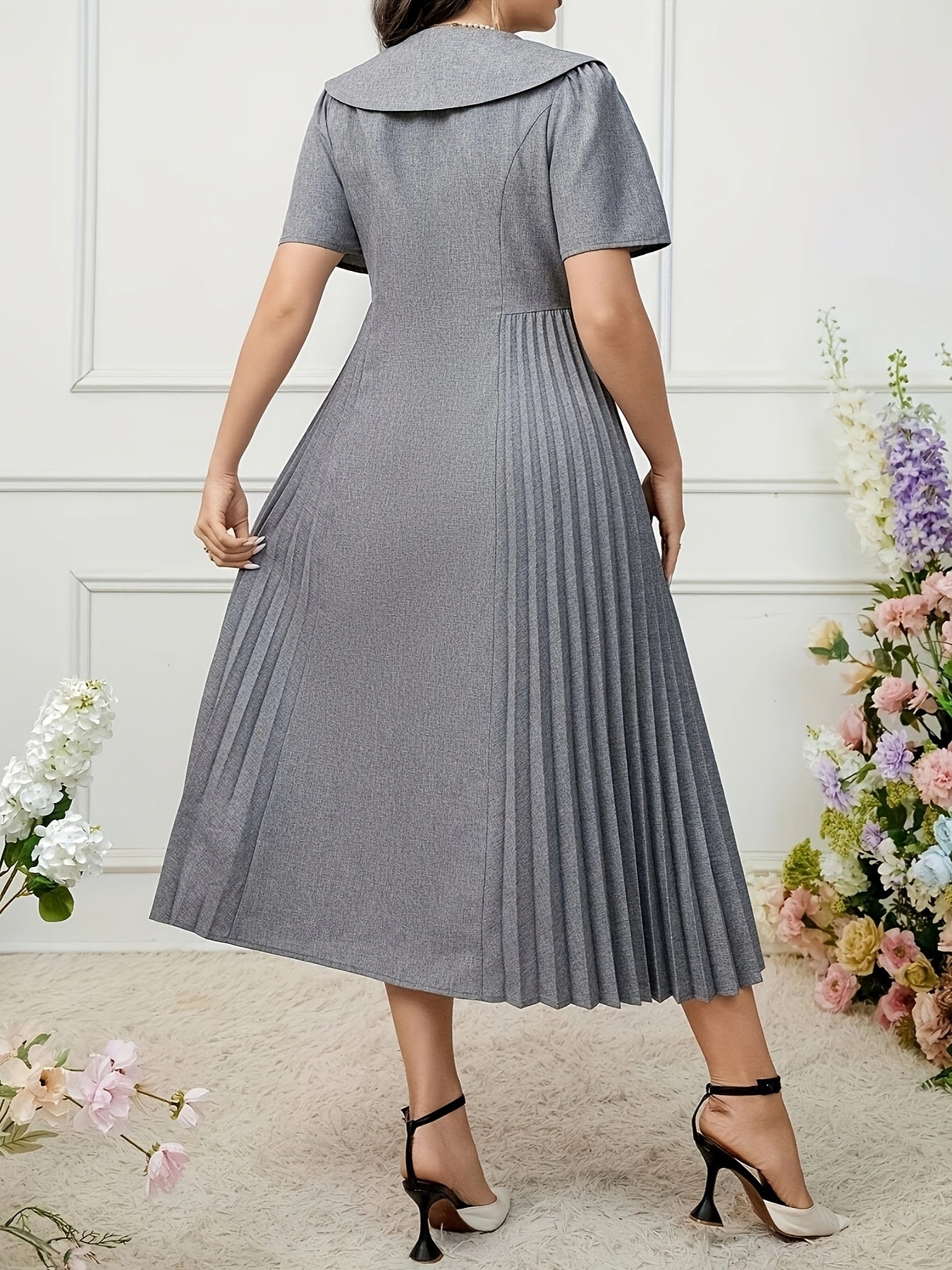 Elegant pleated midi dress made of 95% polyester and 5% spandex blend with short sleeves, contrast lapel collar, loose fit, solid color, non-stretch fabric. Perfect for spring/summer casual