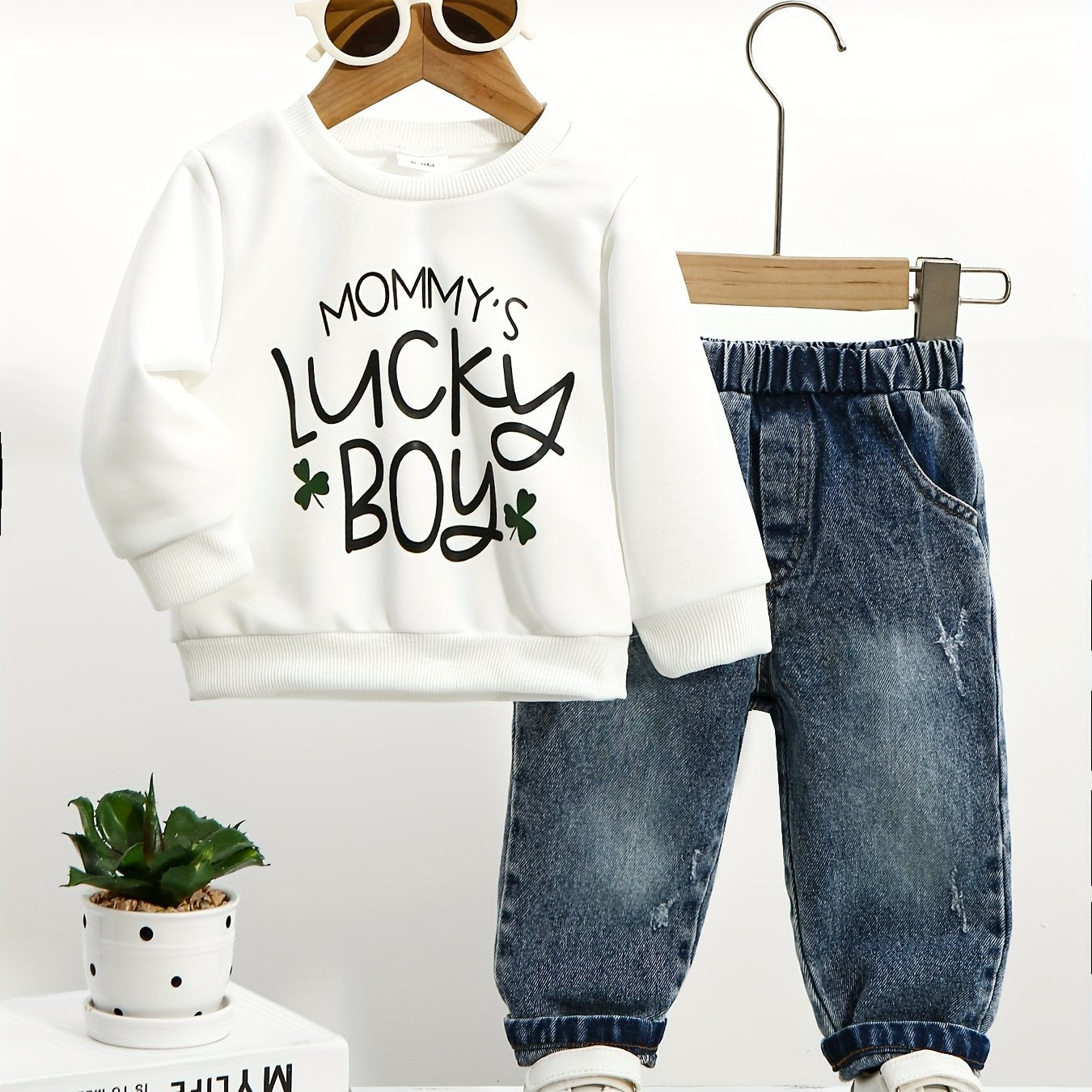 2 piece baby boy outfit set featuring a casual crew neck sweatshirt with "Mommy's Lucky Boy" print and matching denim jeans. Made from cotton blend knit fabric, perfect for the fall/winter