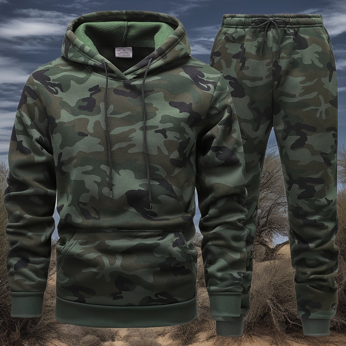 Men's camo hooded sweatshirt and pants set for outdoor activities in fall/winter. 100% polyester with drawstring pullovers and 3D printing. Suitable for hiking, camping, hunting, running